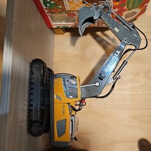 Yellow and Gray Excavator Toy